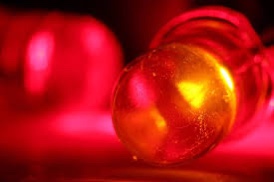A close up image of a red light bulb